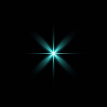 Bright glowing star light effect with blue rays isolated on a solid black background