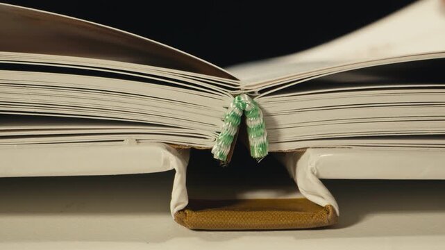 Book new textbook binding close up school university education study literature paper macro
