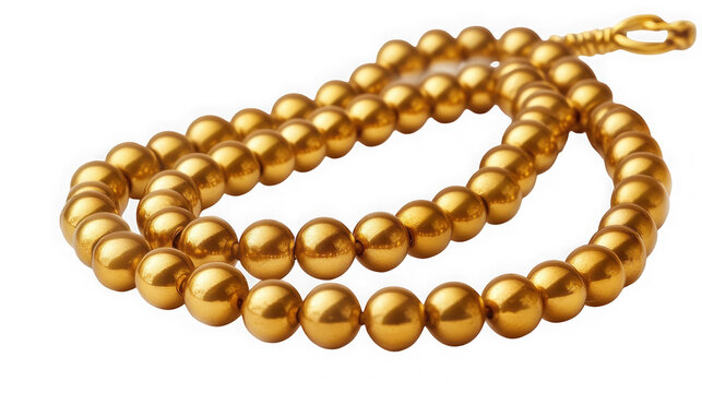 A string of polished golden prayer beads arranged in a loop on a white background with circular string shiny metallic gold beads rests plain white surface decorative collection meditation ornament