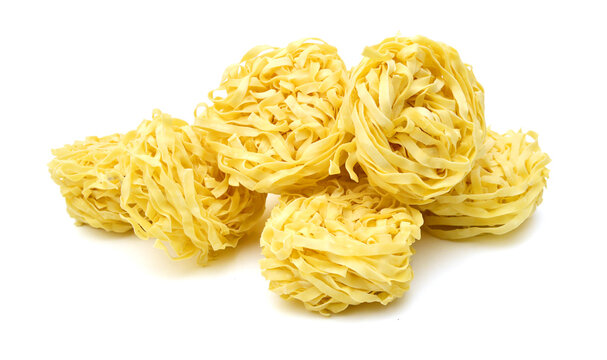 Egg noodles on a white background