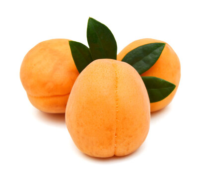 Yellow peaches isolated on white 