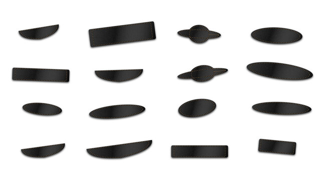Set of various dark grey metallic geometric including rectangles and ringed circles on a plain black background, surface layout