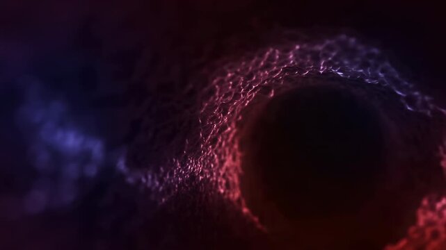 Dark central sphere remains framed by flowing luminous particles as red, magenta, violet, and blue light ripples around a shadowy circular form in a deep black environment