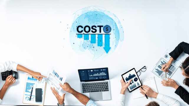 Team of professionals discussing cost reduction strategies in a modern workspace, utilizing technology and data analysis to enhance business efficiency and decision-making. Trope
