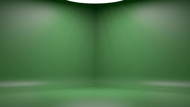 Green studio room corner with soft spotlight lighting and empty space