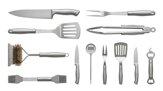 Collection of stainless steel barbecue grilling tools and kitchen utensils