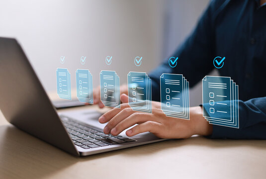 The document approval process, integrated with automated workflow management systems, facilitates legal compliance and digital business operations. Business professionals are reviewing documents.