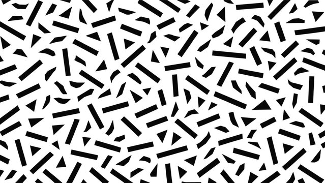An abstract pattern composed of scattered black geometric shapes, including rectangles, triangles, and curved lines, arranged randomly on a white background.