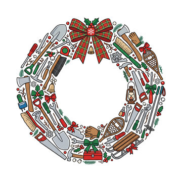 Handcrafted Christmas wreath made of colorful winter tools and holiday ornaments for festive decor