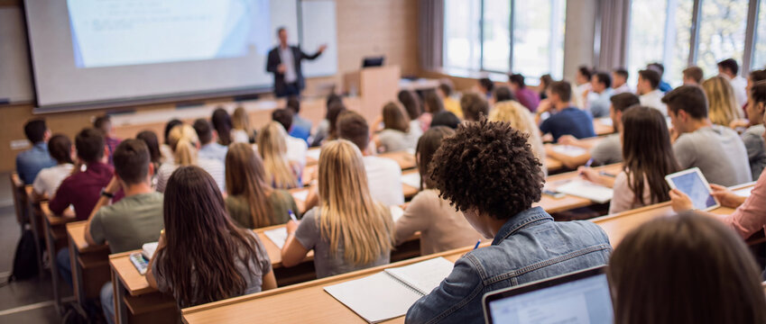 Full lecture hall with student audience at university college, back to school conference presentation room, training seminar meeting