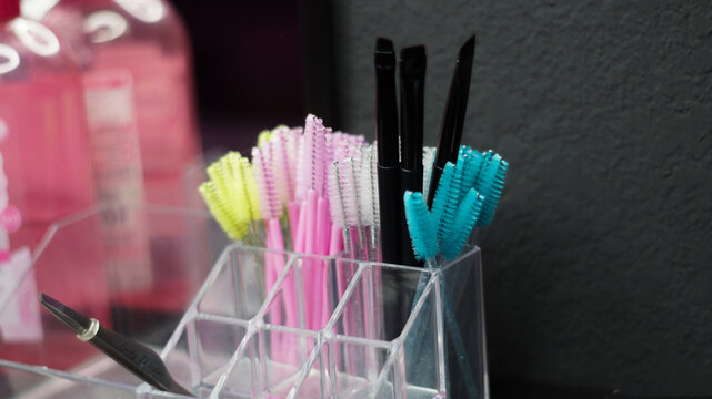 Professional hairdressing accessories and tools on beauty salon workspace tabletop