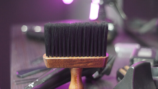 Professional hairdressing accessories and tools on beauty salon workspace tabletop