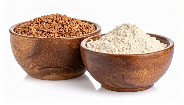 Bowl of buckwheat flour isolated on white background