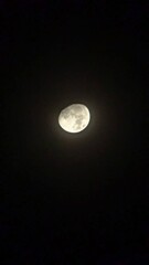 full moon in the night sky © Rizqi Iftikhar