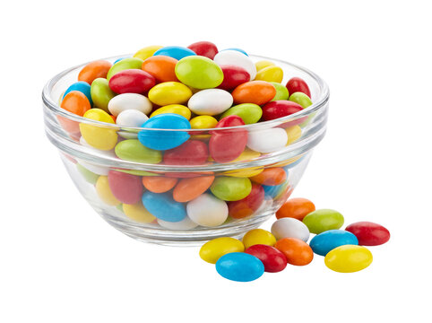 Colorful candy in glass bowl isolated on transparent background