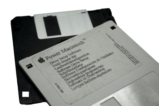 Power Macintosh Drive Setup Software Floppy Disks Isolated on Transparent Background in Cairo, Egypt on Aug,21,2026 illustrating Data storage nostalgia, 1990s desktop operating 