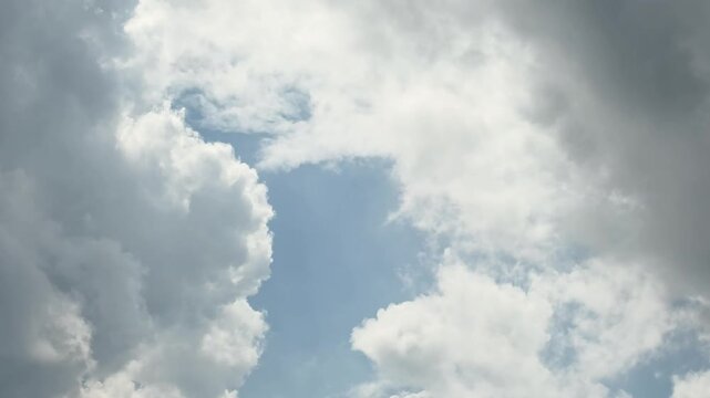 Clouds Framing a Clear Blue Sky Opening