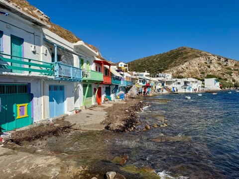 Colorful Greek buildings along the sea - view of colorful Klima on Milos