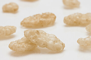 Fototapeta premium Rice Puffs Crisps Crispies cereal assorted close up on white