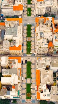 Vertical video. Thessaloniki, Greece. Aristotelous Square, a rare preplanned waterfront plaza with curved eclectic facades, Drone footage over the central axis and Thermaikos Gulf. Drone footage. Ric