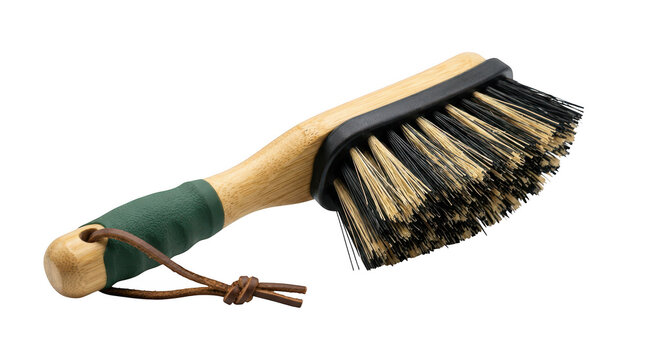 Wooden scrub brush with green rubber grip and leather strap isolated on transparent background