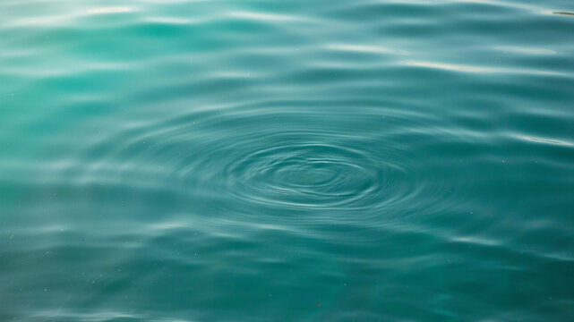 Abstract swirls of teal and turquoise water with subtle ripples and soft light, creating a soothing and fluid background, with a sense, of depth keywords:, water, liquid, fluid, teal, turquoise, blue
