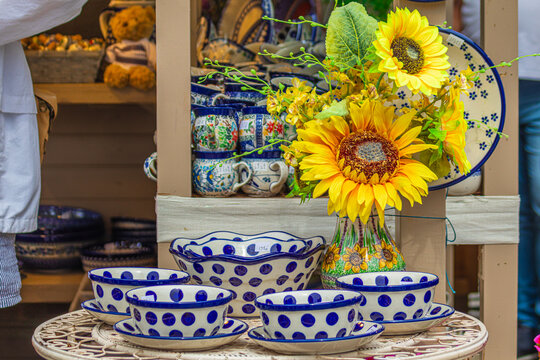 Polish blue polka dot pottery bowls on market display