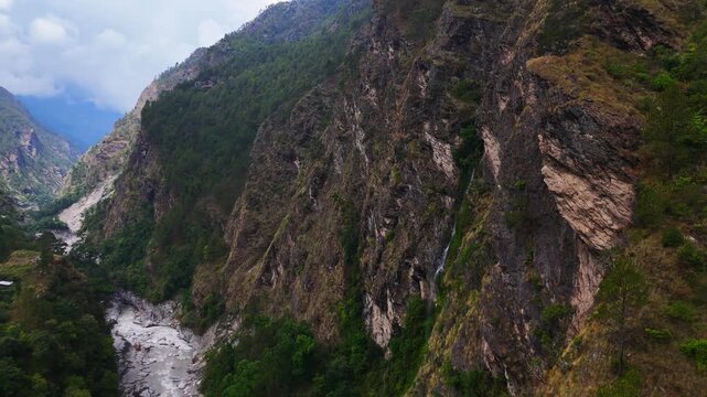 Rasuwagadhi, Nepal - 29 August 2026: Aerial view of the Trishuli river flowing through a deep, rocky mountain gorge surrounded by lush green forests.