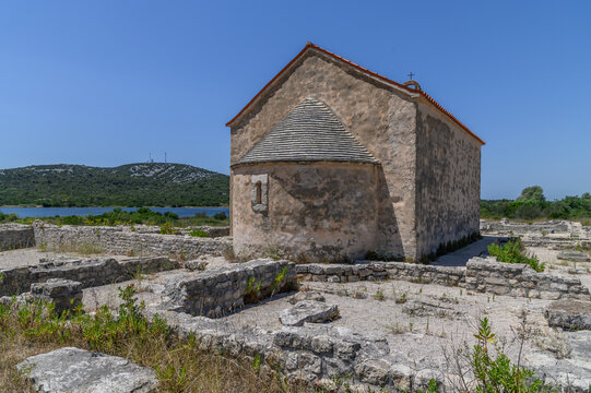 Stone shingled apse roof of the church of St Martin above the Roman ruins at Ivinj, Croatia