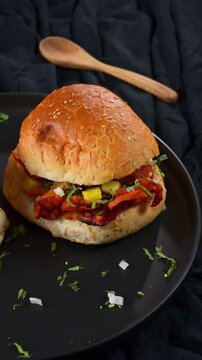 Traditional poblana cemita filled with marinated al pastor pork meat, pineapple and fresh herbs
