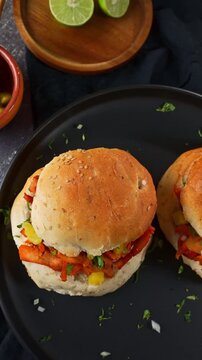 Traditional poblano cemita sandwich with al pastor pork and fresh toppings