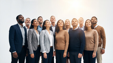 Fototapeta premium Diverse business team looking upward with hopeful expressions. Corporate culture, teamwork, leadership, innovation, success.