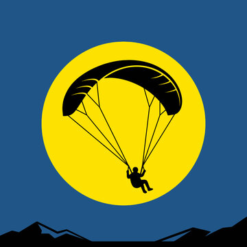 Silhouette of Paraglider Against a Vibrant Full Moon Sky