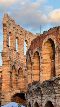 Historic stone arches and brickwork of Roman amphitheater in Verona Italy