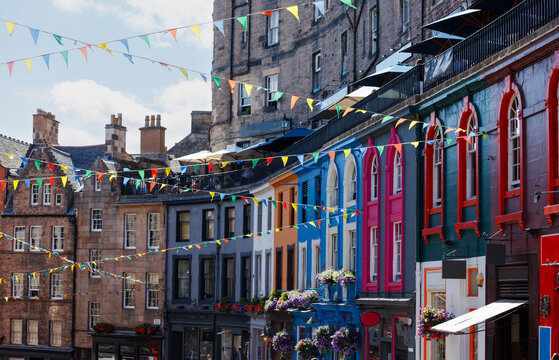 Colorful row houses along lively Victoria street, Edinburgh, UK