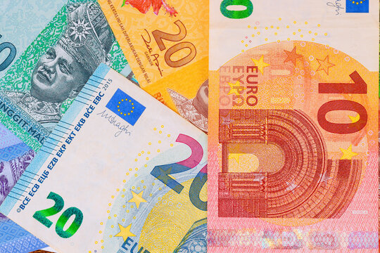 Various banknotes are Malaysian ringgit, European cash with different values designs, highlighting