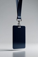 Obraz premium Minimalist dark blue lanyard and ID card holder mockup. Clean background, pro accessory for identity access or promotion. Simple design, corporate essential.