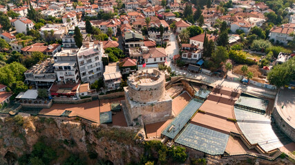 Obraz premium Aerial view of Hidirlik Tower and historic Kaleici rooftops in Antalya, Turkey