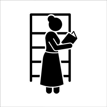 Woman reading a book in library icon