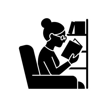 Woman reading book in armchair vector icon