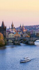 Fototapeta premium Scenic river view with historic cityscape at sunset.