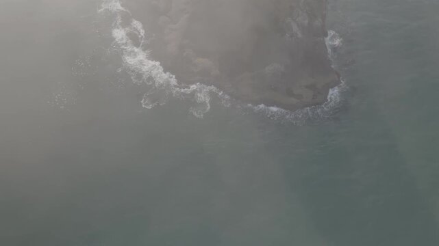 Aerial view of misty rugged coastline off Washington coast , ocean waves of Olympic Peninsula (D-log / Ungraded version)