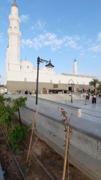 Pilgrims gather at the beautiful white Masjid Quba plaza in Medina.