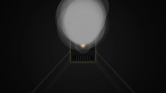 A vintage steam train locomotive approaching fast on tracks through a dark tunnel at night with bright headlight beam shining ahead 4K Motion Video