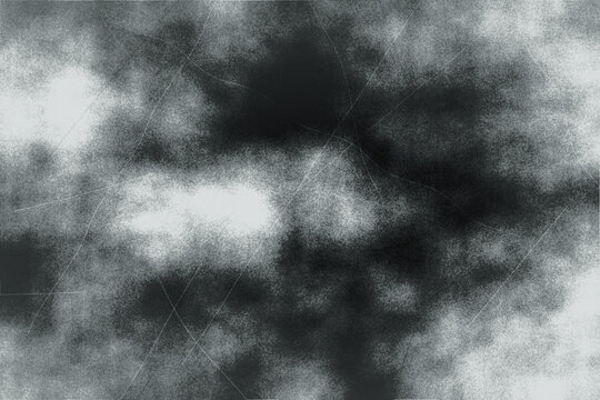 Abstract monochrome grunge background features dark charcoal gray and light silver clouds with subtle fine scratched lines for moody artistic designs.