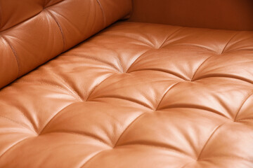 Luxury interior design and comfort, brown leather sofa texture with tufted upholstery and soft cushions for home decor or high-end furniture catalog © Pixel-Shot