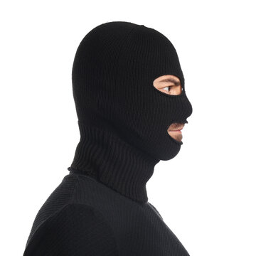 Young man wearing balaclava on white background