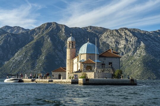 The artificial island of Gospa od Skrpjela with the church of St. Mary on the rock near Perast on the Bay of Kotor, Montenegro