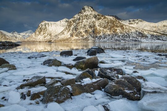 Winter Scandinavian landscape, ice floes, mountains, snow, Vareid, Nordland, Lofoten, Norway