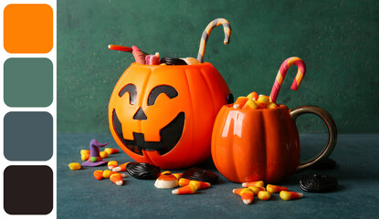 Naklejka premium Halloween celebration and trick or treat concept, pumpkin candy buckets filled with sweets and lollipops on a dark green textured background